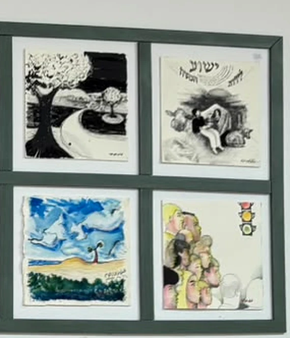 Four of the eight Mike Wald paintings in their green frame on the cafe wall